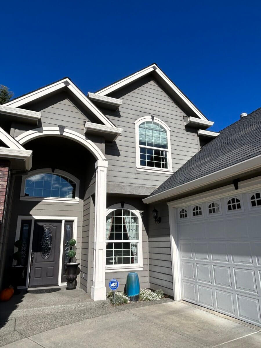 Professional window cleaning service in action