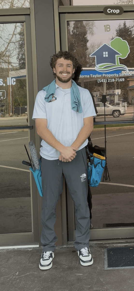 Professional window cleaning technician at work